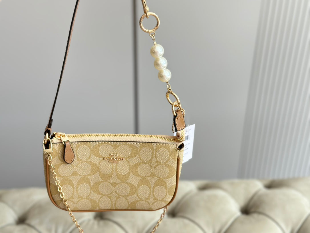 شنطة كتف نوليتا 19 بلوقو الماركة من كوتش